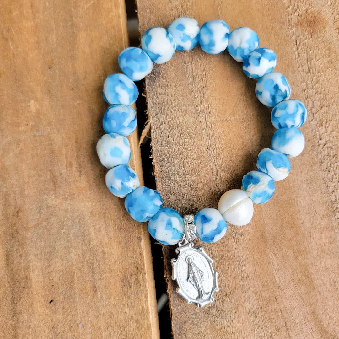 { Miraculous Medals Blues }
